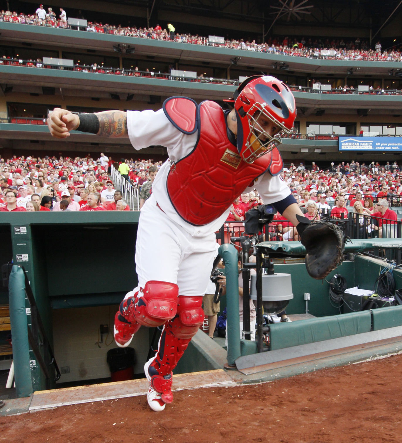 Molina bounds out of the dugout in 2013